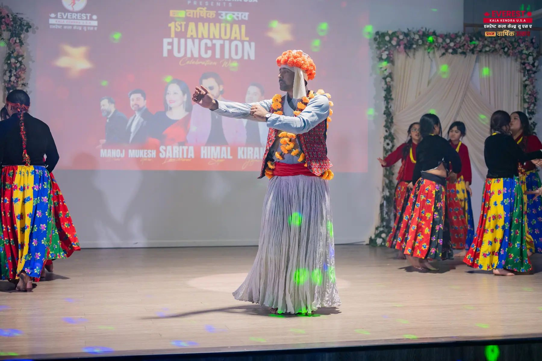 EKK dancers in traditional costume performing the closing number of the annual function